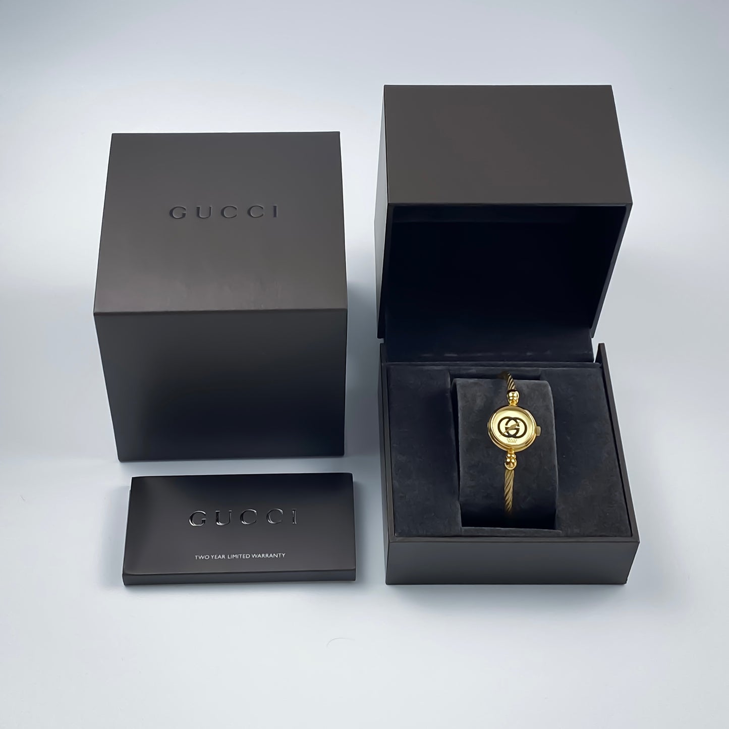 Gucci Vintage Gold Champagne Dial Logo Wire