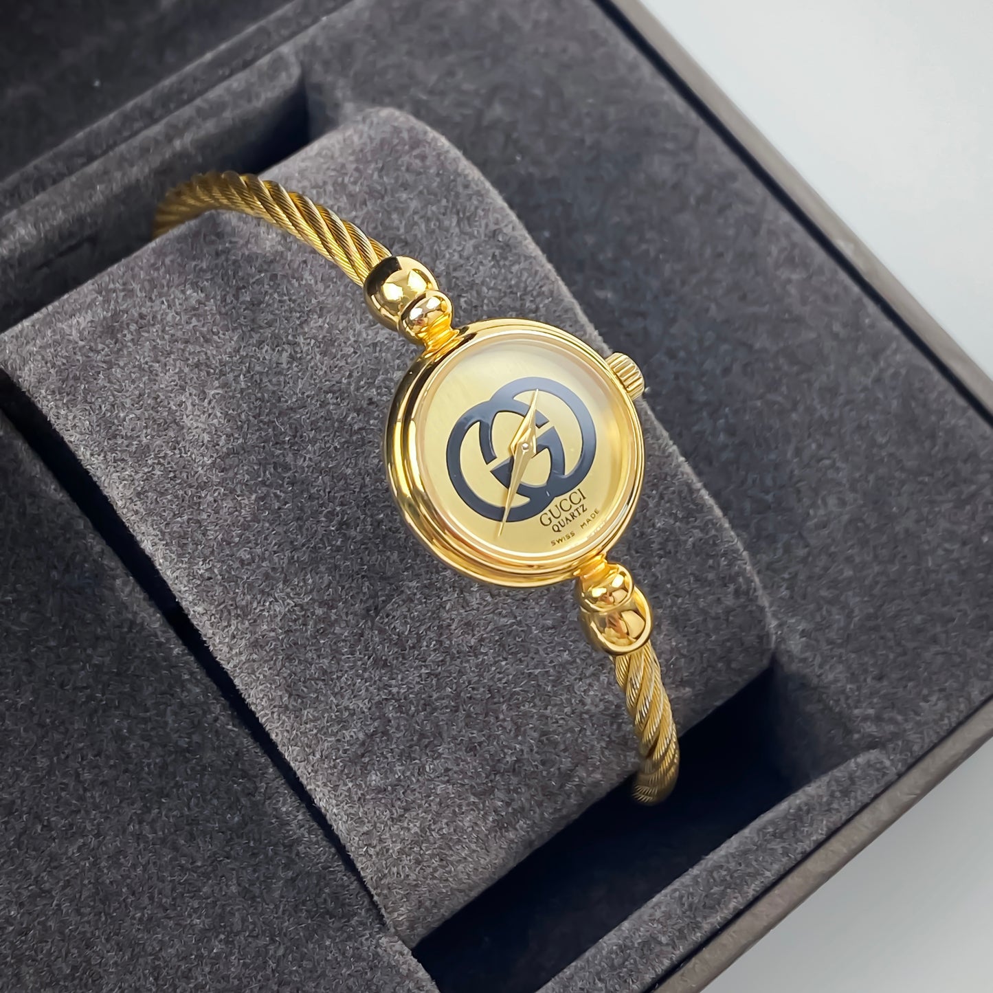 Gucci Vintage Gold Champagne Dial Logo Wire