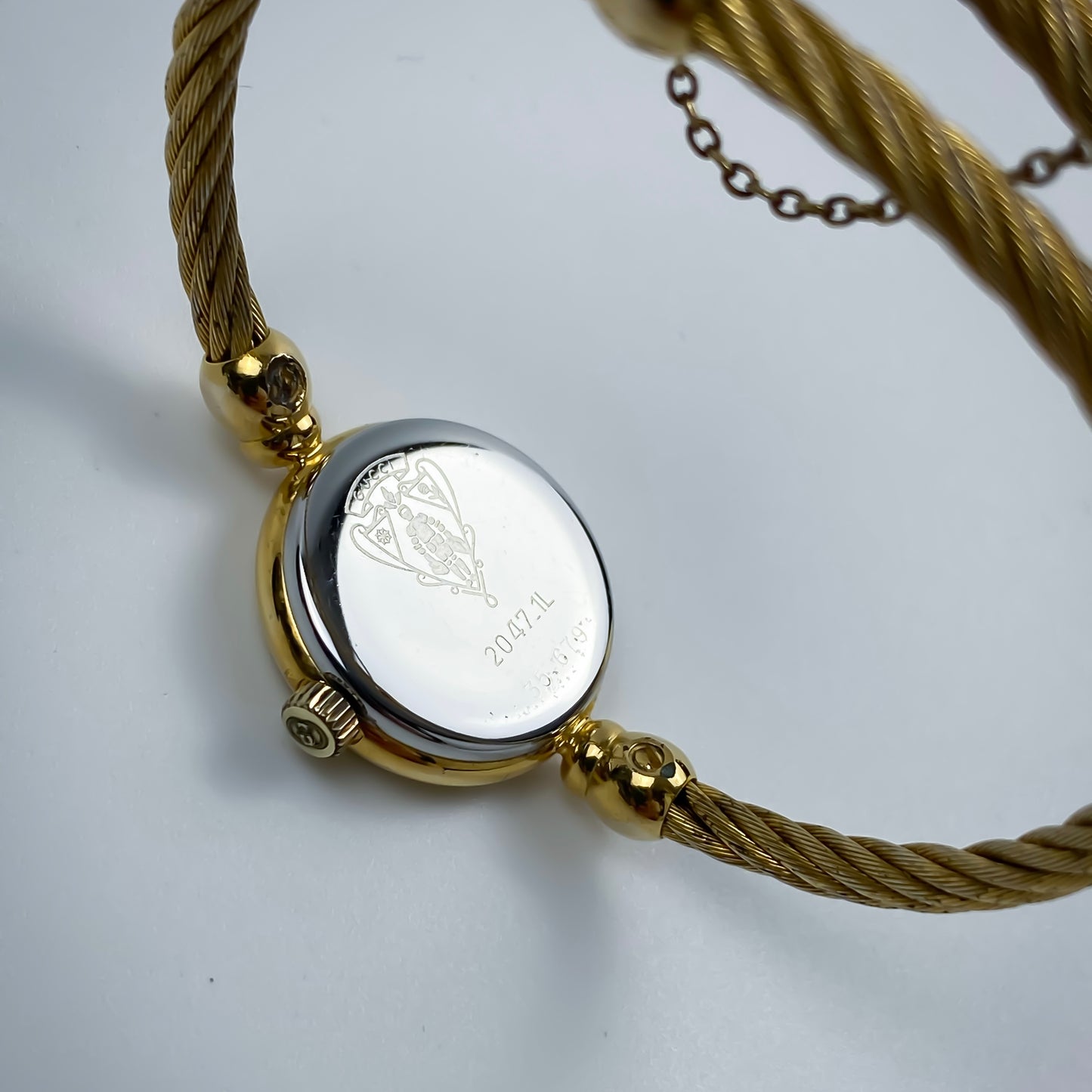 Gucci Vintage Gold Champagne Dial Logo Wire