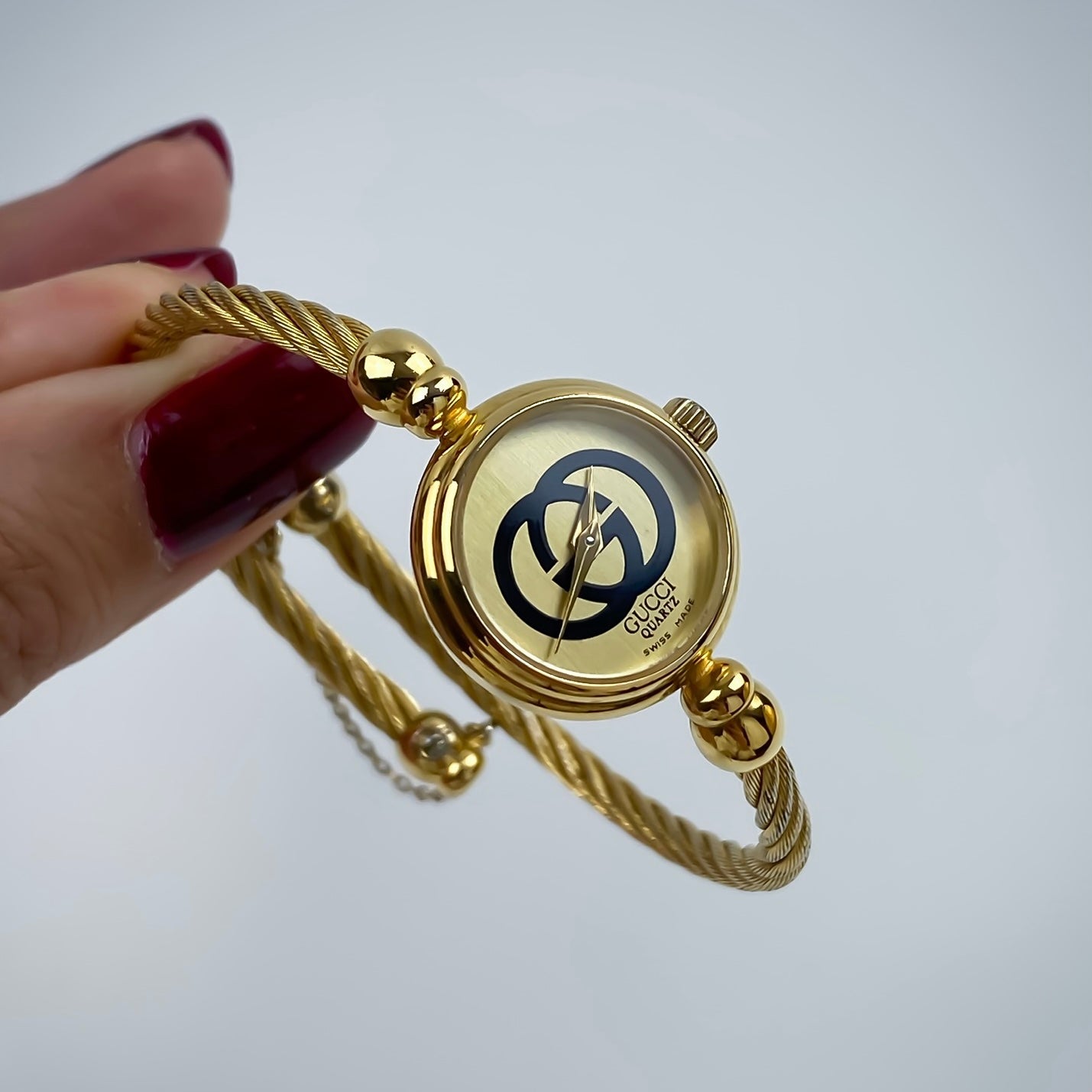 Gucci Vintage Gold Champagne Dial Logo Wire