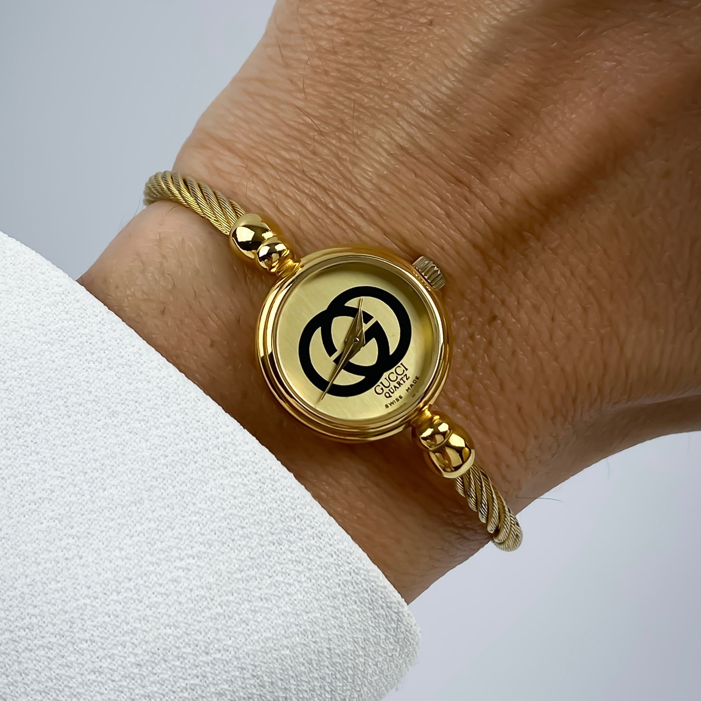 Gucci Vintage Gold Champagne Dial Logo Wire