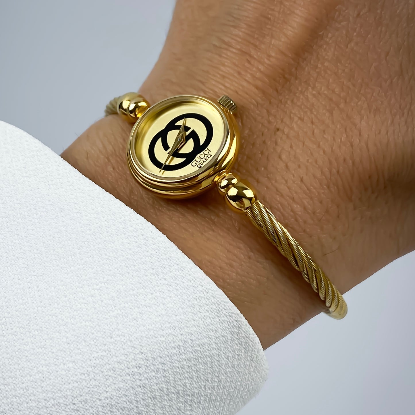 Gucci Vintage Gold Champagne Dial Logo Wire