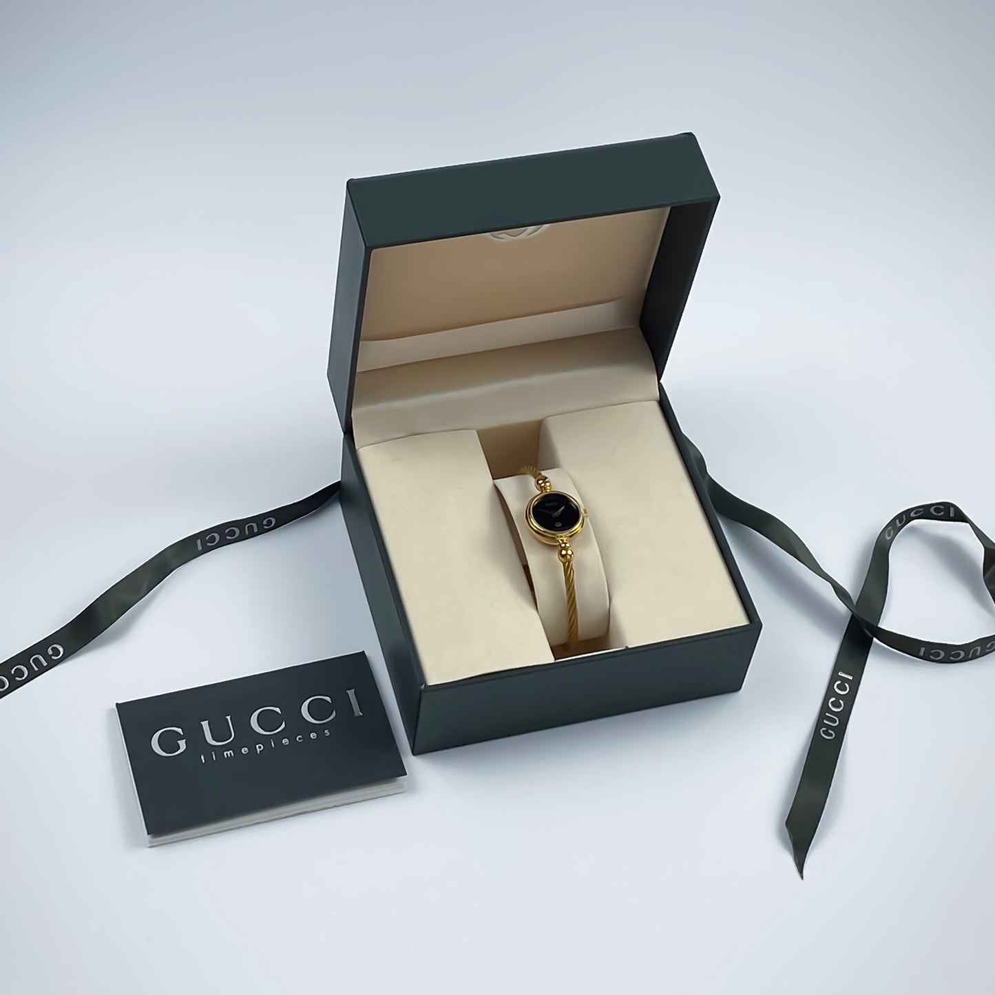 Gucci Vintage Gold Black Dial Wire